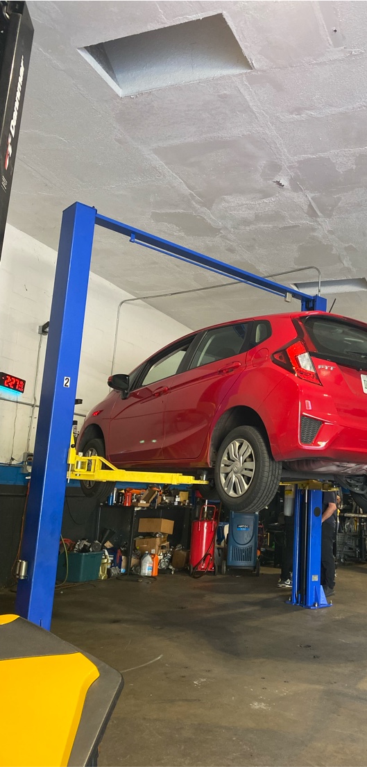 Vehicle on lift at Palmway Auto Service